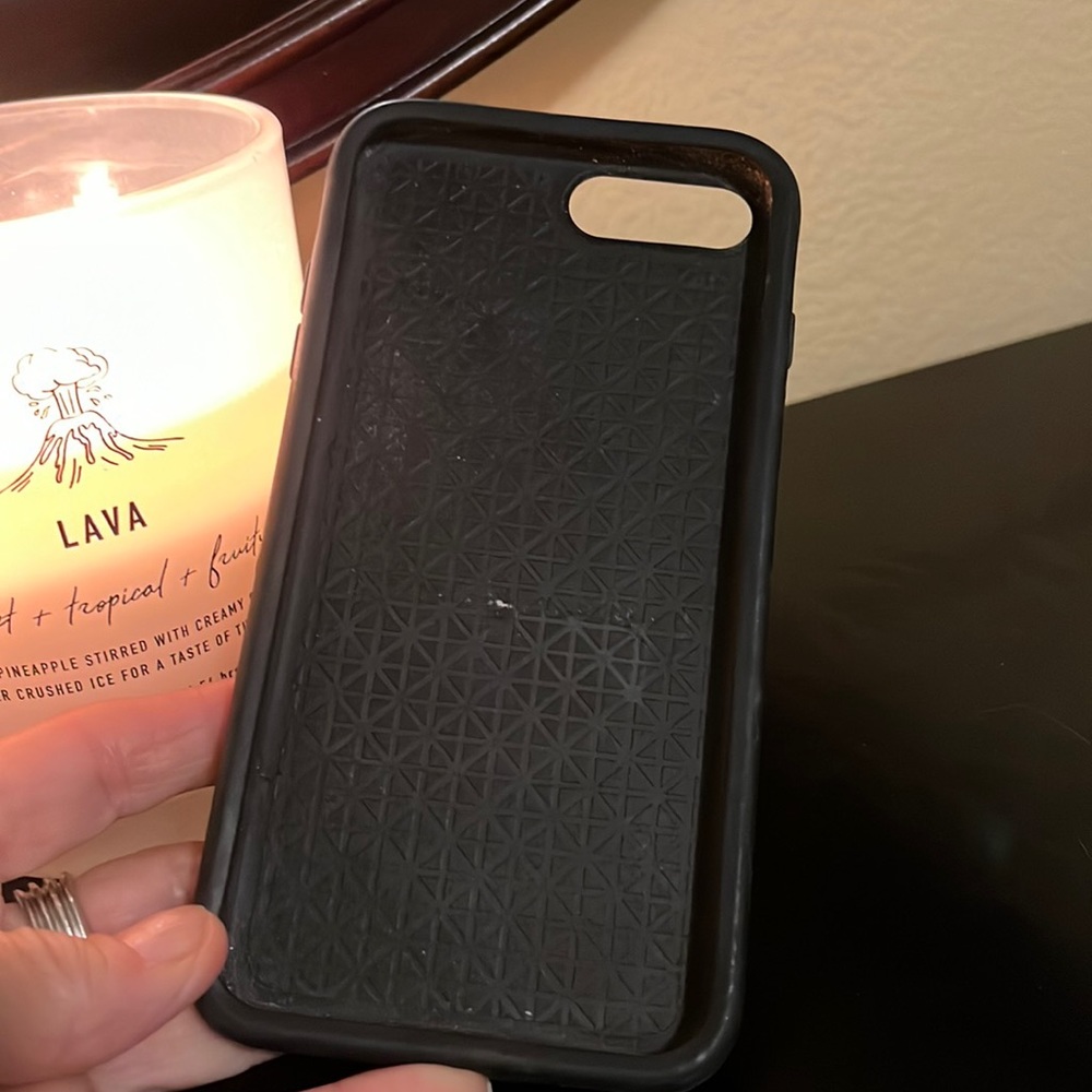 OtterBox defender 8+ iPhone cover in great shape With pop socket on the back